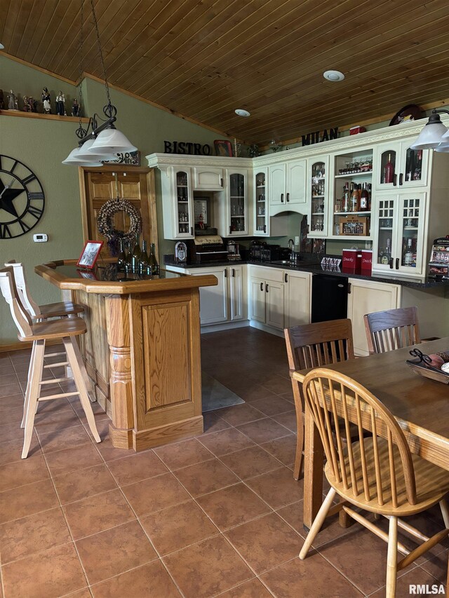 13916 Leisure Ln, Benton, IL 62812 - kitchen with wood ceiling, dark tile patterned floors, lofted ceiling, open shelves, and a center island