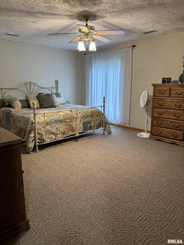 13916 Leisure Ln, Benton, IL 62812 - bedroom featuring carpet floors, a textured ceiling, ceiling fan, and baseboards