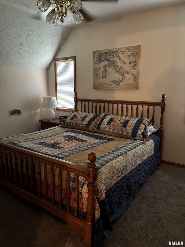 13916 Leisure Ln, Benton, IL 62812 - bedroom with carpet flooring, vaulted ceiling, a ceiling fan, and a textured ceiling