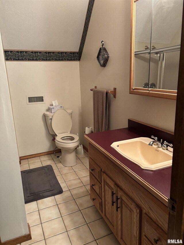 13916 Leisure Ln, Benton, IL 62812 - bathroom featuring toilet, tile patterned flooring, and vanity
