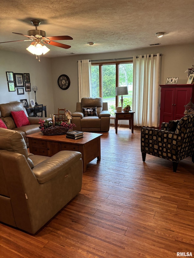 13916 Leisure Ln, Benton, IL 62812 - living room with hardwood / wood-style floors, ceiling fan, and a textured ceiling