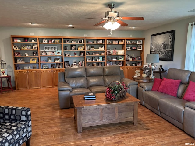 13916 Leisure Ln, Benton, IL 62812 - living area with a ceiling fan and wood finished floors