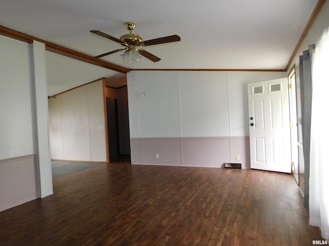 403 E Sycamore St, Kinmundy, IL 62854 - unfurnished room featuring wood finished floors, vaulted ceiling, ceiling fan, ornamental molding, and a decorative wall