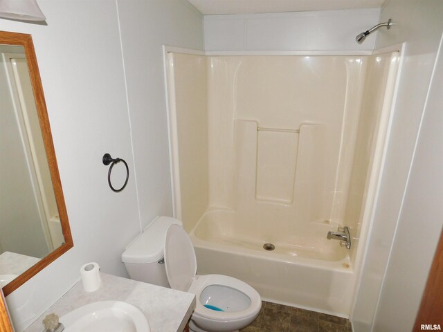 403 E Sycamore St, Kinmundy, IL 62854 - bathroom with toilet, vanity, and washtub / shower combination