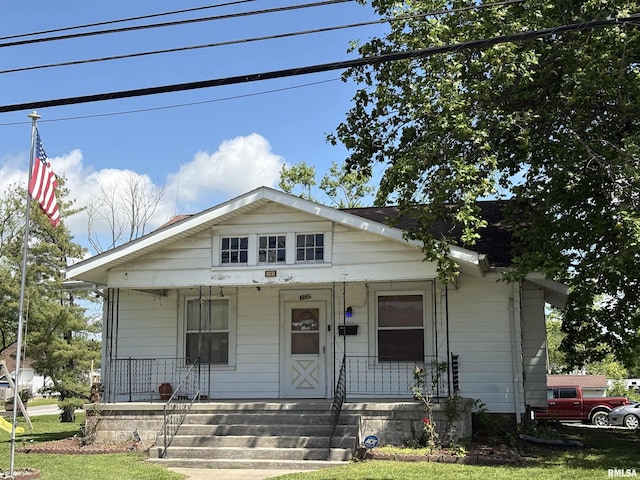 bungalow-style home with covered porch