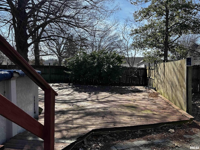 402 S Main St, Benton, IL 62812 - wooden deck with a fenced backyard