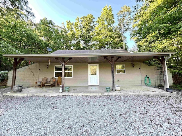 7544 Geranium Rd, Oakdale, IL 62268 - back of house with a patio area