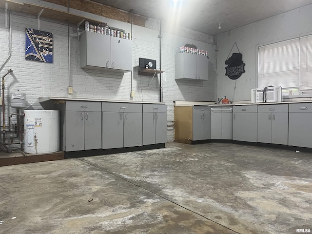 7544 Geranium Rd, Oakdale, IL 62268 - kitchen with gray cabinets and unfinished concrete flooring