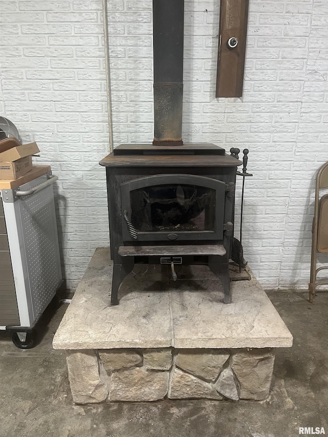 7544 Geranium Rd, Oakdale, IL 62268 - detailed view of a wood stove and concrete flooring
