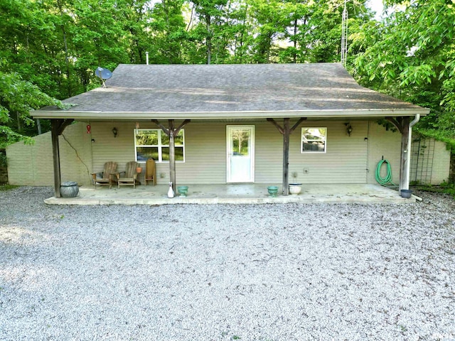 7544 Geranium Rd, Oakdale, IL 62268 - view of front of home featuring a shingled roof and a porch