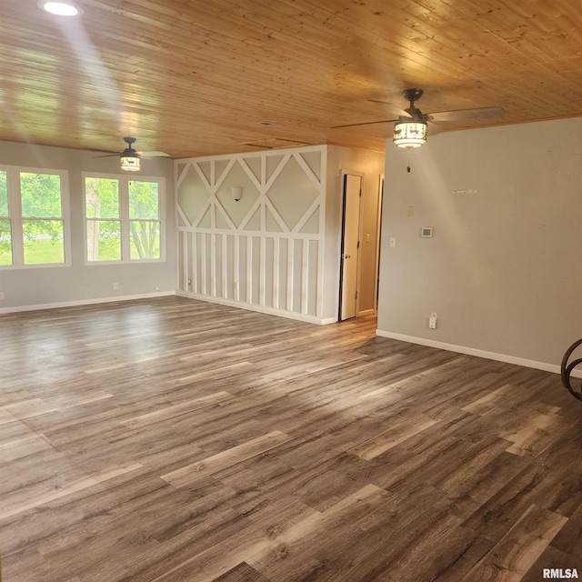 15267 N Woodlawn Ln, Woodlawn, IL 62898 - unfurnished living room featuring ceiling fan, wooden ceiling, baseboards, and wood finished floors
