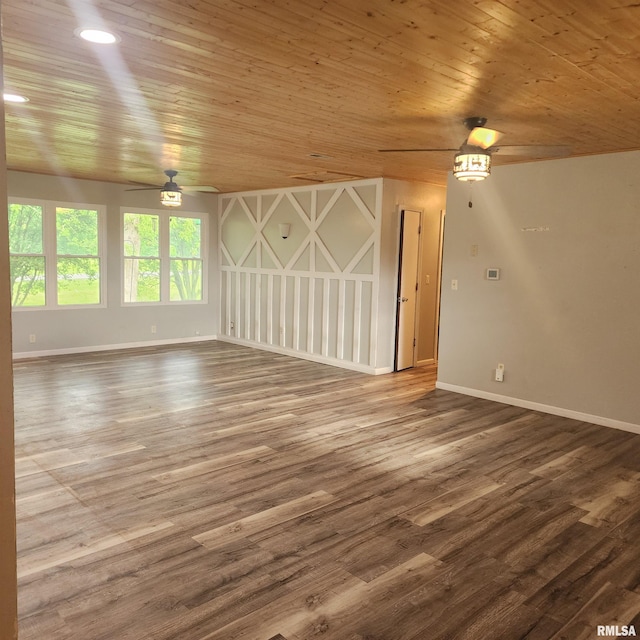 15267 N Woodlawn Ln, Woodlawn, IL 62898 - unfurnished living room featuring ceiling fan, baseboards, wood ceiling, and wood finished floors