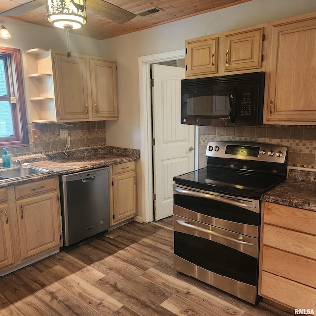 15267 N Woodlawn Ln, Woodlawn, IL 62898 - kitchen featuring appliances with stainless steel finishes, decorative backsplash, light brown cabinets, and wood finished floors