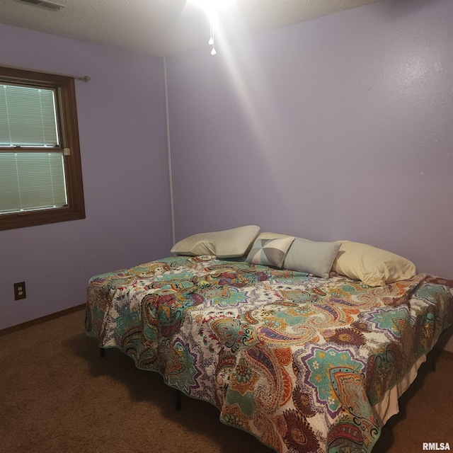 15267 N Woodlawn Ln, Woodlawn, IL 62898 - carpeted bedroom featuring baseboards