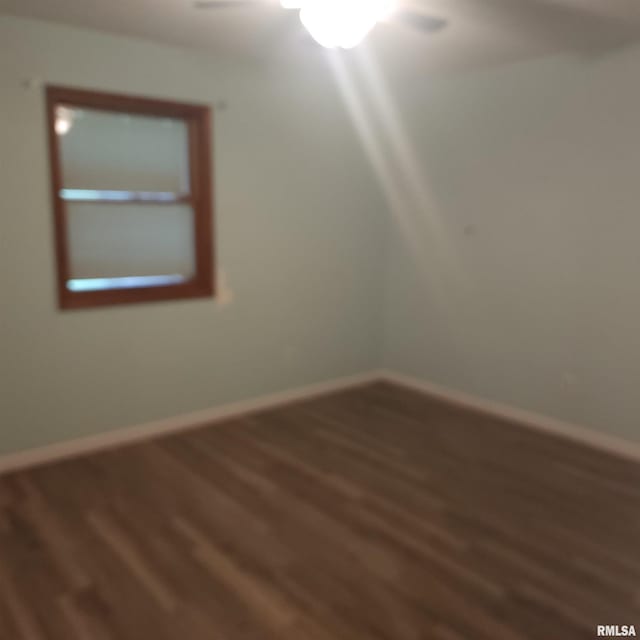 15267 N Woodlawn Ln, Woodlawn, IL 62898 - empty room with wood finished floors and baseboards