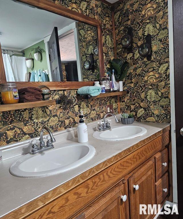 160 Front St, Elizabethtown, IL 62931 - full bathroom with wallpapered walls and double vanity