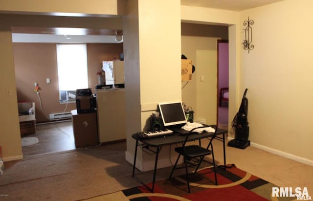 310 W Pecan St, Carbondale, IL 62901 - home office with a baseboard radiator, carpet flooring, and baseboards