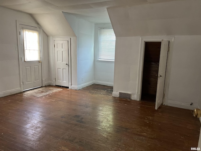 404 W Elm St, Carbondale, IL 62901 - bonus room with lofted ceiling, hardwood / wood-style floors, baseboards, and healthy amount of natural light