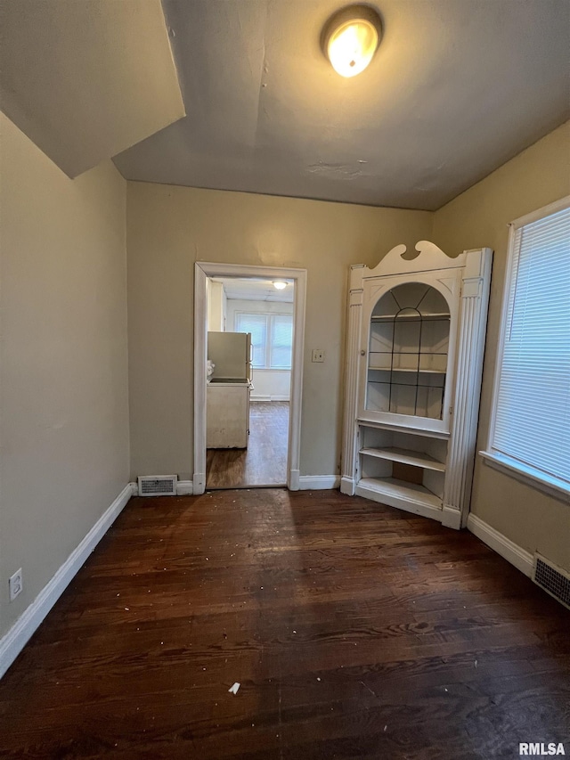 404 W Elm St, Carbondale, IL 62901 - unfurnished dining area with wood finished floors and baseboards
