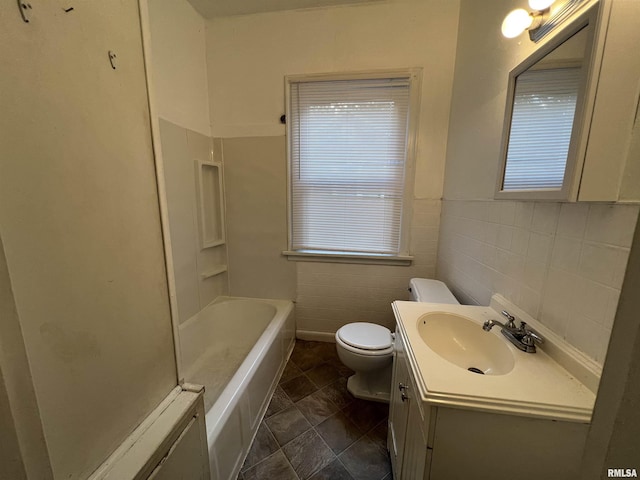 404 W Elm St, Carbondale, IL 62901 - bathroom featuring toilet, vanity, and plenty of natural light