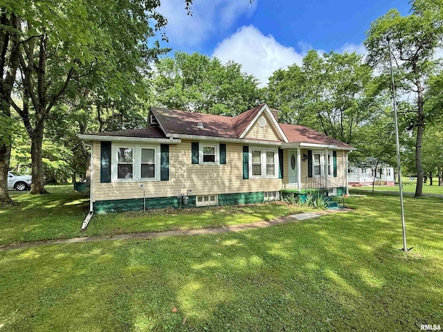 6556 S US-45 Rd, Brookport, IL 62910 - view of front facade featuring a front lawn and view of scattered trees