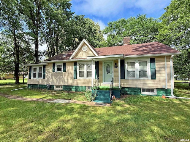 6556 S US-45 Rd, Brookport, IL 62910 - view of front facade with a front yard and a chimney