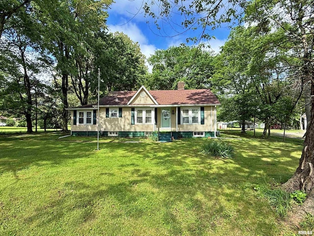 6556 S US-45 Rd, Brookport, IL 62910 - ranch-style house with a chimney and a front yard