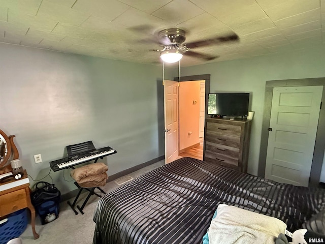 6556 S US-45 Rd, Brookport, IL 62910 - bedroom featuring carpet and a ceiling fan