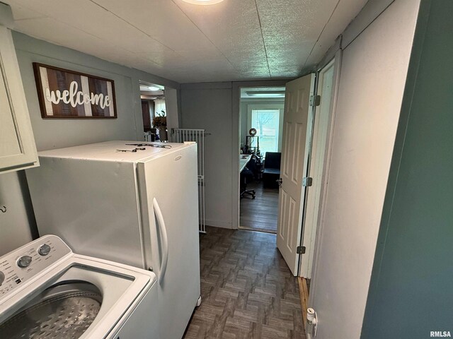 6556 S US-45 Rd, Brookport, IL 62910 - washroom featuring washer / dryer, cabinet space, and a textured ceiling