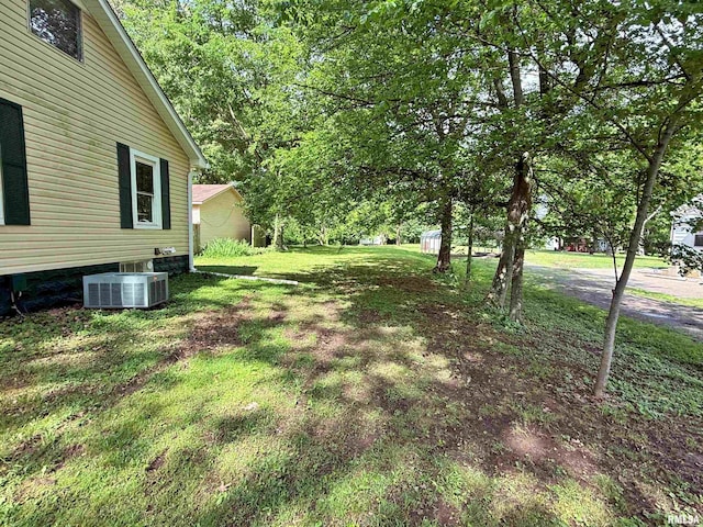 6556 S US-45 Rd, Brookport, IL 62910 - view of grassy yard with central AC