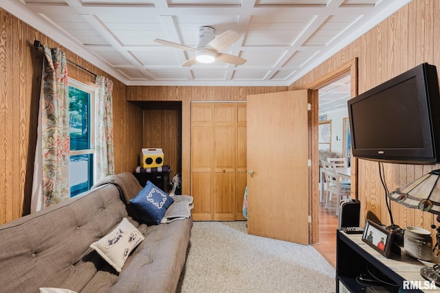 2560 Egyptian Hills Dr, Creal Springs, IL 62922 - living room featuring wood walls, ceiling fan, and light carpet