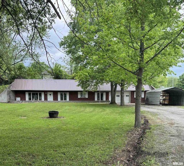 405 S Park Ct, Percy, IL 62292 - ranch-style house featuring driveway, brick siding, a carport, and a front yard