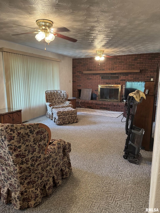 405 S Park Ct, Percy, IL 62292 - living area with a fireplace, ceiling fan, and carpet floors