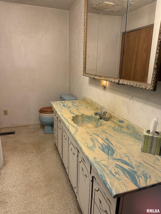 405 S Park Ct, Percy, IL 62292 - bathroom with a textured wall, vanity, and toilet