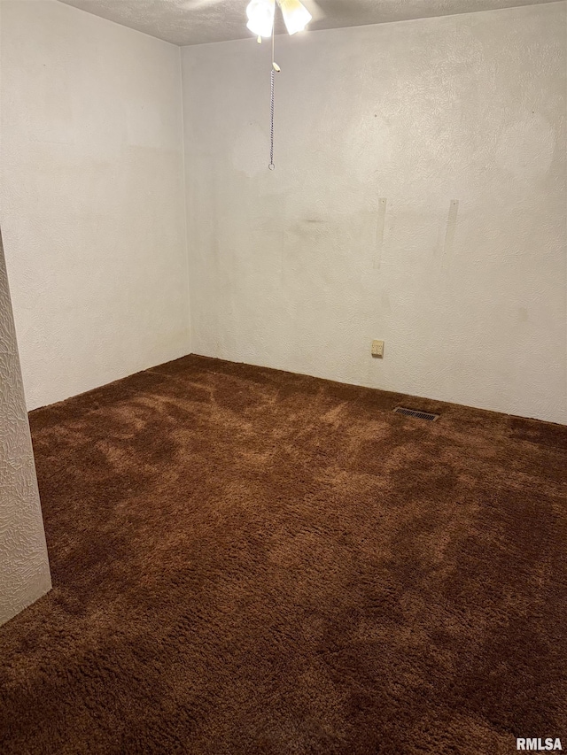 405 S Park Ct, Percy, IL 62292 - empty room with dark carpet and ceiling fan