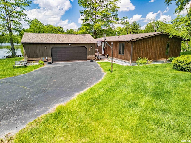631 Community Beach Rd, Centralia, IL 62801 - view of front of house with driveway, an attached garage, and a front yard