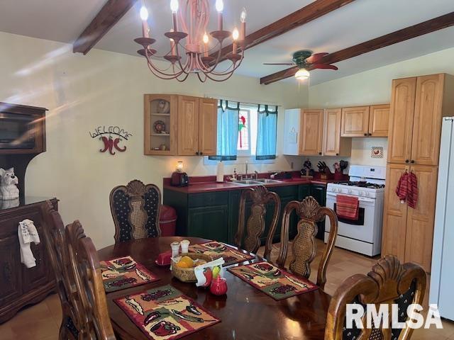 kitchen featuring white appliances, a sink, beamed ceiling, glass insert cabinets, and a chandelier