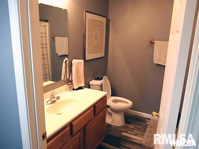 103 Chase Ln, Marion, IL 62959 - full bath with vanity, toilet, and wood finished floors