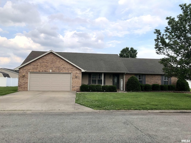 103 Chase Ln, Marion, IL 62959 - ranch-style house featuring brick siding, driveway, an attached garage, and a shingled roof