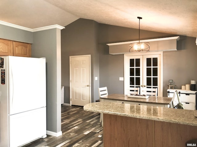 103 Chase Ln, Marion, IL 62959 - kitchen with freestanding refrigerator, vaulted ceiling, dark wood finished floors, french doors, and decorative light fixtures