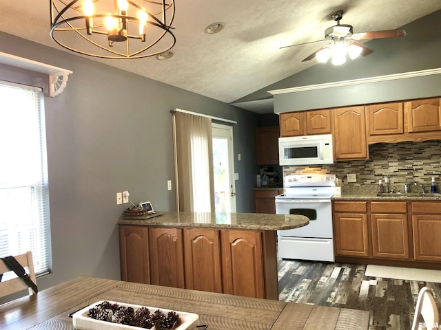 103 Chase Ln, Marion, IL 62959 - kitchen with white appliances, lofted ceiling, dark wood-style flooring, a sink, and tasteful backsplash