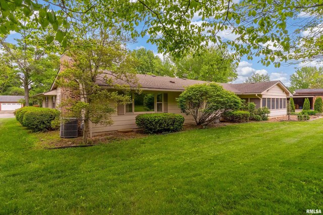 2605 W Sunset Dr, Carbondale, IL 62901 - view of front of home featuring a front yard and central AC unit