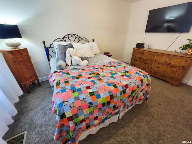 214 W 12th St, Flora, IL 62839 - carpeted bedroom featuring baseboards