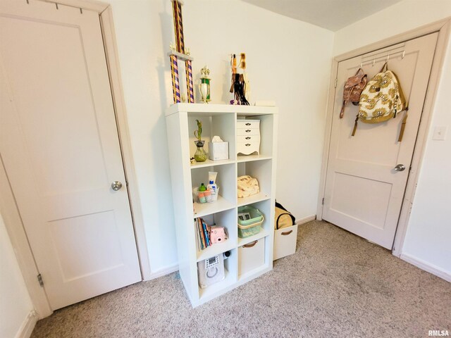 214 W 12th St, Flora, IL 62839 - recreation room with carpet floors and baseboards