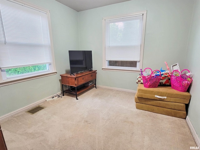 214 W 12th St, Flora, IL 62839 - living area featuring carpet and baseboards