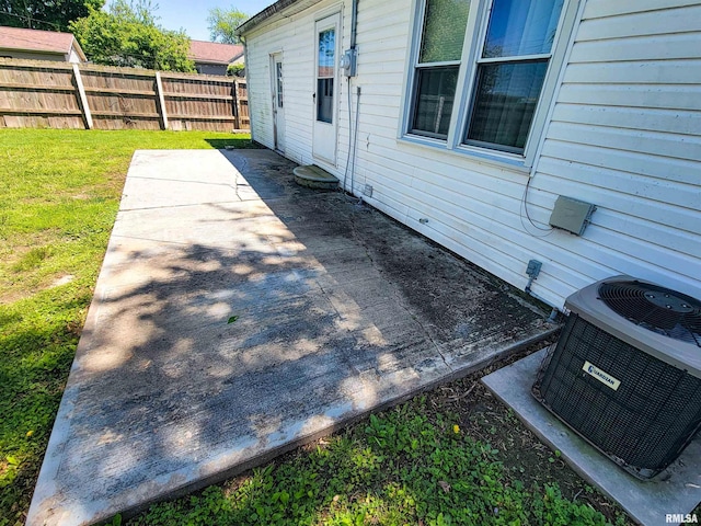 214 W 12th St, Flora, IL 62839 - view of patio / terrace featuring cooling unit