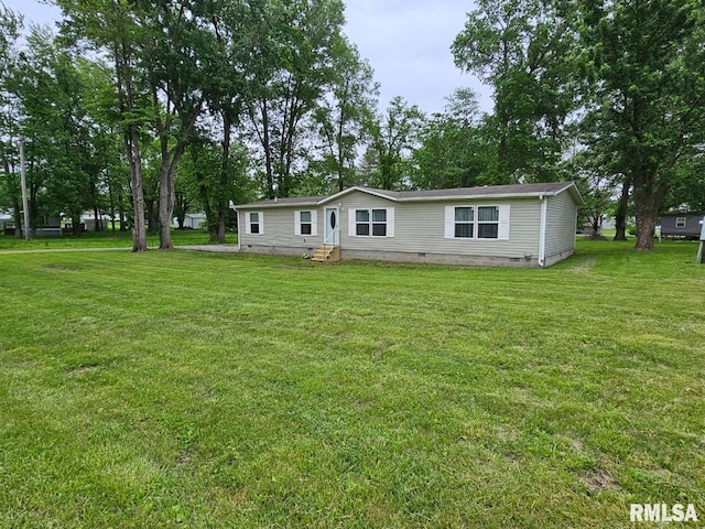 901 W 4th St, Bluford, IL 62814 - view of front facade featuring crawl space, a front yard, and entry steps