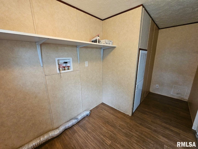 901 W 4th St, Bluford, IL 62814 - laundry room with hookup for a washing machine, dark wood-type flooring, crown molding, and a textured ceiling