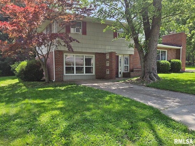 2 Parker Dr, Mount Vernon, IL 62864 - colonial house featuring brick siding and a front yard