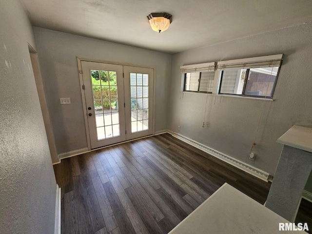 2 Parker Dr, Mount Vernon, IL 62864 - doorway to outside with baseboards, dark wood-style flooring, and a textured wall